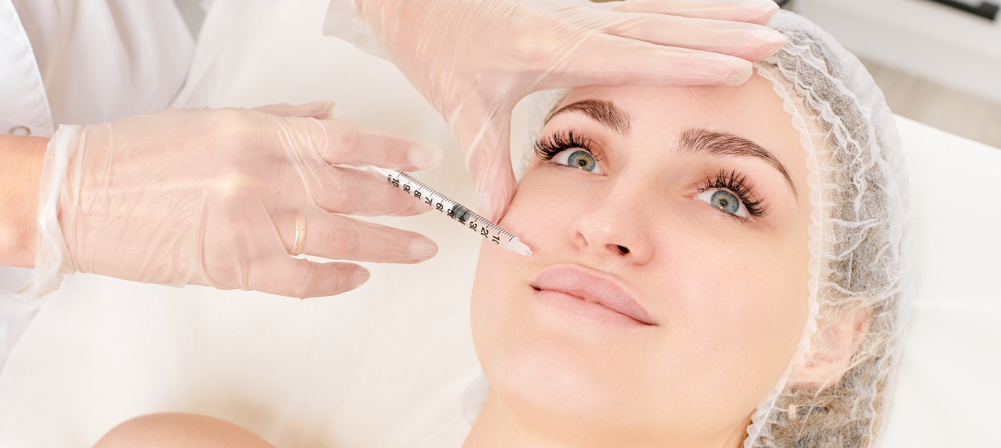 Photo of a woman receiving dermal fillers in Knoxville at The Spring